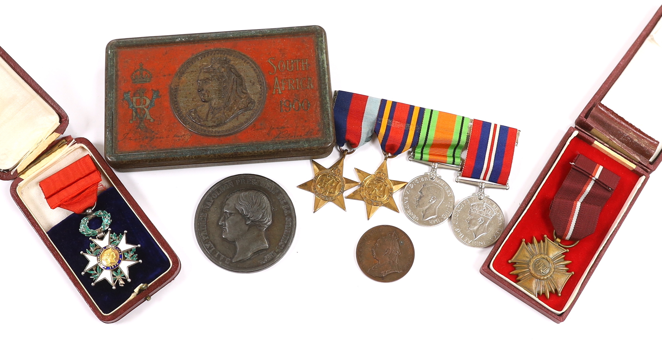 A WWII medal group comprising The Burma Star, The 1939-1945 Star, The Defence medal and The War medal, a cased 1870 Republique Francaise medal, a Victoria Golden Jubilee medallion, an 1855 Napoleon medallion, a Polish Cr